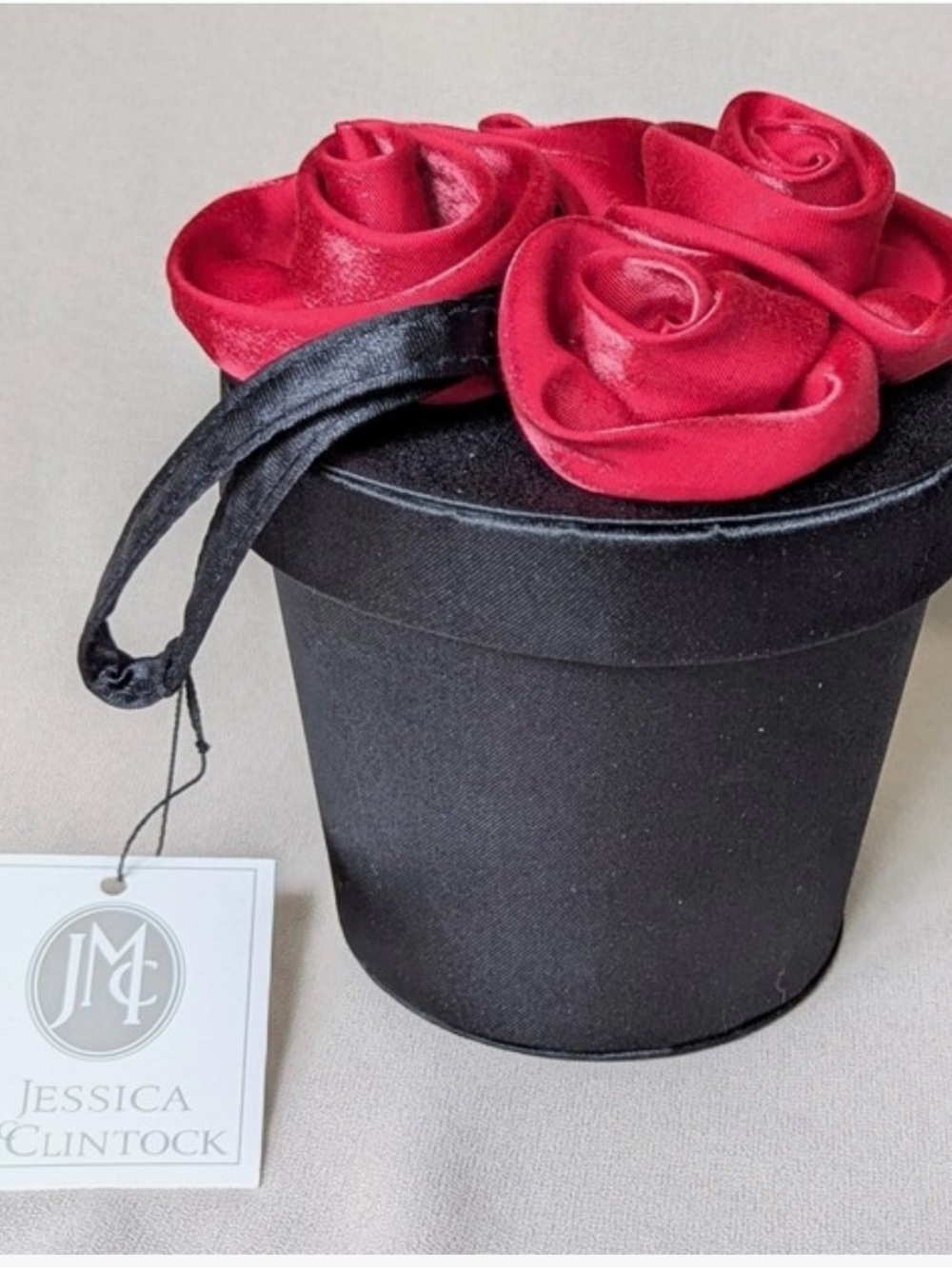 Jessica McClintock Black bag with Red Satin Roses